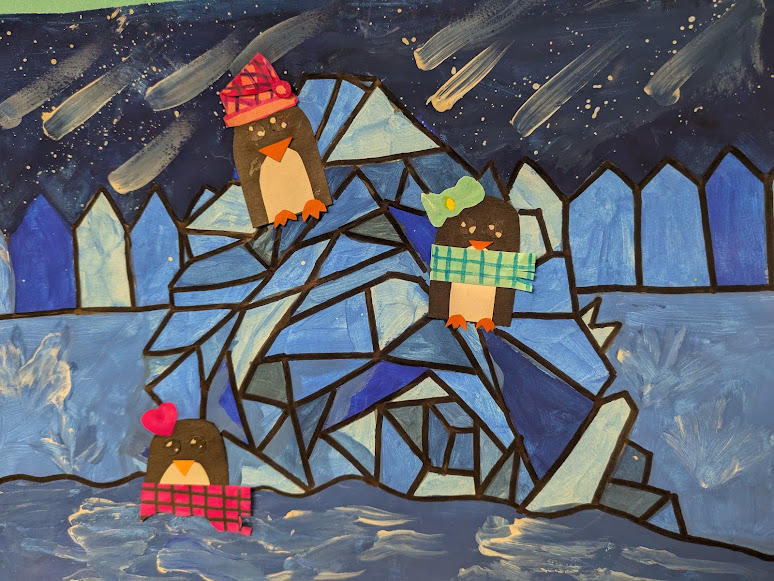 Three penguins sit near an iceberg collage in front of a dark starry sky